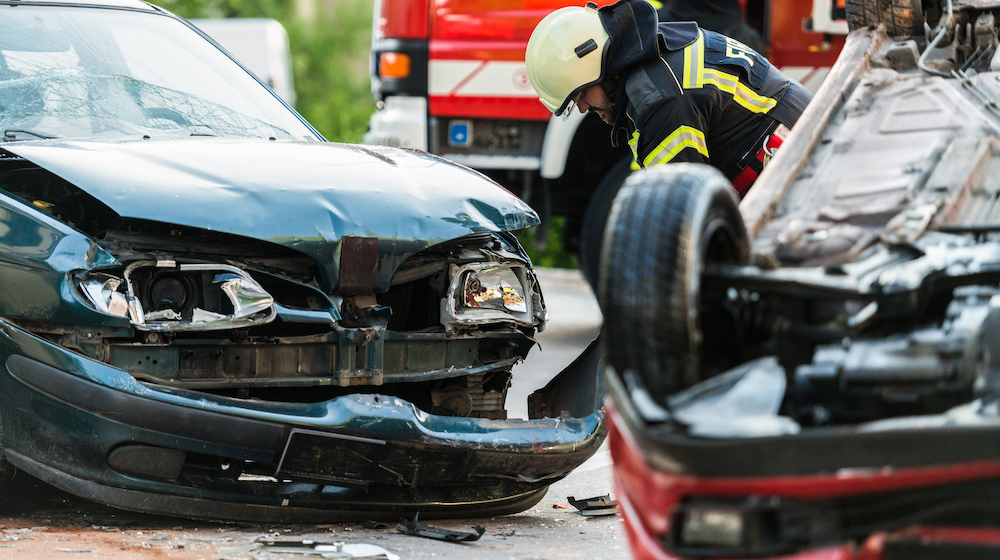 Firefighters At A Car Accident Scene
